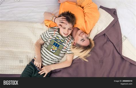 mom and son sharing the bed|A Mother and Son Bonding in the Bedroom .